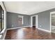 Bedroom with wood floors, a large window and a closet at 5312 11Th Street E Cir, Bradenton, FL 34203