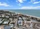 Beautiful coastal home with a private pool and stunning views of the ocean and beach at 597 Buttonwood Dr, Longboat Key, FL 34228