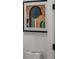 Modern art work hangs above the toilet at 597 Buttonwood Dr, Longboat Key, FL 34228