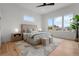 Bright bedroom offers a large window, accent rug, and modern decor at 597 Buttonwood Dr, Longboat Key, FL 34228