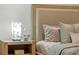 Close up of a lamp and nightstand in the bedroom at 597 Buttonwood Dr, Longboat Key, FL 34228