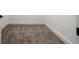 Empty closet featuring neutral carpet and white trim at 597 Buttonwood Dr, Longboat Key, FL 34228