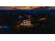 Stunning luxury home with a pool, large windows, and gorgeous sunset views at 597 Buttonwood Dr, Longboat Key, FL 34228