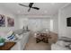Bright living room with neutral walls, plush seating, and stylish decor provides a comfortable area for relaxation and entertainment at 597 Buttonwood Dr, Longboat Key, FL 34228
