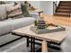 Close-up of a stylish coffee table and decor in a comfortable, inviting living space at 597 Buttonwood Dr, Longboat Key, FL 34228