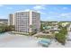 Scenic view of condo features beach access, manicured lawn, and access to nearby amenities at 5970 Midnight Pass Rd # 177, Sarasota, FL 34242