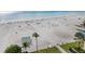 Expansive beach view features plenty of sunbathers, beautiful white sand, and a relaxing beachfront at 5970 Midnight Pass Rd # 177, Sarasota, FL 34242