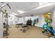 Fully-equipped fitness center featuring weights, benches, mirrors, and exercise machines at 5970 Midnight Pass Rd # 177, Sarasota, FL 34242