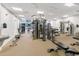 On-site gym includes modern workout machines, weights, mirrors, and drinking fountain at 5970 Midnight Pass Rd # 177, Sarasota, FL 34242