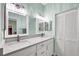 Bright bathroom featuring a double vanity, quartz countertop, modern fixtures, and ample storage space at 6314 Stone River Rd # 6314, Bradenton, FL 34203