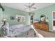 Cozy bedroom with neutral carpeting, large window, and ample natural light at 6314 Stone River Rd # 6314, Bradenton, FL 34203