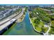 This aerial view showcases the property's prime waterfront location and proximity to coastal amenities at 6415 Midnight Pass Rd # 211, Sarasota, FL 34242
