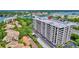 This waterfront property features boat docks, manicured landscaping, and a central location at 6415 Midnight Pass Rd # 211, Sarasota, FL 34242