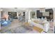 Spacious open-concept living room with modern furniture and stylish decor at 6415 Midnight Pass Rd # 211, Sarasota, FL 34242