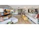 Spacious living room with large TV, and comfortable seating with stylish accents at 6415 Midnight Pass Rd # 211, Sarasota, FL 34242