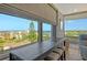 Balcony bar seating offering gorgeous views of the city at 6415 Midnight Pass Rd # 910, Sarasota, FL 34242