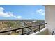 Balcony view of bridge, waterways and tropical landscape at 6415 Midnight Pass Rd # 910, Sarasota, FL 34242