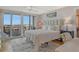 Bedroom with balcony access and view of the city at 6415 Midnight Pass Rd # 910, Sarasota, FL 34242