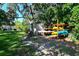 Kayak storage area next to lush landscaping provides outdoor enthusiasts a space for their equipment at 6415 Midnight Pass Rd # 910, Sarasota, FL 34242