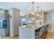 Beautiful kitchen with marble countertops and breakfast bar at 6415 Midnight Pass Rd # 910, Sarasota, FL 34242