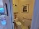 Cozy bathroom features toilet, storage cabinet and tiled floors at 6916 Stoneywalk Ct # 6916, Bradenton, FL 34203