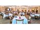 A grand dining room with elegantly set tables, perfect for hosting memorable gatherings and celebrations at 6916 Stoneywalk Ct # 6916, Bradenton, FL 34203