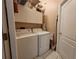 Convenient laundry room equipped with washer, dryer, and ample storage at 6916 Stoneywalk Ct # 6916, Bradenton, FL 34203