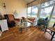 Relaxing sunroom with scenic water views, comfortable seating, and lots of natural light at 6916 Stoneywalk Ct # 6916, Bradenton, FL 34203