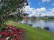 Enjoy serene water views from this home, complemented by lush landscaping and a tranquil setting at 6916 Stoneywalk Ct # 6916, Bradenton, FL 34203