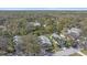 Beautiful home with a backyard pond nestled among the trees at 7312 Eleanor Cir, Sarasota, FL 34243