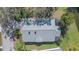 Top down aerial of home showing roof detail and screened in patio at 7312 Eleanor Cir, Sarasota, FL 34243