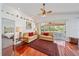 Comfortable living room with a ceiling fan and natural lighting at 7312 Eleanor Cir, Sarasota, FL 34243