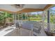 Water view from the covered lanai and screened patio at 7312 Eleanor Cir, Sarasota, FL 34243