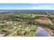 Aerial view of homes and the surrounding neighborhood including some undeveloped areas at 7601 226 E St, Bradenton, FL 34211