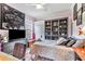 This cozy bedroom features unique decor, built-in shelving, and comfortable furnishings at 7601 226 E St, Bradenton, FL 34211