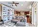 Cozy living area with built-in bookshelves and ample natural light at 7601 226 E St, Bradenton, FL 34211