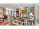 Open-concept living area with built-in shelving, stylish decor, and hardwood flooring offers a welcoming atmosphere at 7601 226 E St, Bradenton, FL 34211