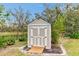 A well-maintained outdoor shed offers additional storage space and complements the landscape at 7601 226 E St, Bradenton, FL 34211