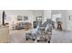 Bright living room with vaulted ceiling, ceiling fan, modern furniture and serene decor at 801 Montrose Dr # 202, Venice, FL 34293