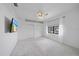 White bedroom with a ceiling fan, carpet floors, and a window with coverings at 820 Placid Lake Dr, Osprey, FL 34229