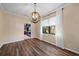 Dining room boasts hardwood floors, neutral paint, large window with bright natural light at 820 Placid Lake Dr, Osprey, FL 34229