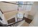 Spacious foyer with hardwood floors, staircase and double-door entry with decorative glass at 820 Placid Lake Dr, Osprey, FL 34229