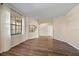 Spacious living room with hardwood floors, natural light, and decorative archways at 820 Placid Lake Dr, Osprey, FL 34229