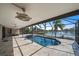 Screened pool area with spacious deck and lake views at 820 Placid Lake Dr, Osprey, FL 34229