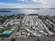 Aerial view of the community showcasing its layout, pool, pickleball and proximity to Longboat Key and Longboat Pass at 10315 Cortez W Rd # 28-1, Bradenton, FL 34210