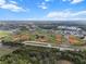 Aerial view showcasing multiple sports fields, including baseball, tennis, and football at 10406 Eastwood Dr, Bradenton, FL 34211