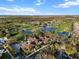 Gorgeous aerial view of golf course community featuring lush greenery and scenic lakes at 10406 Eastwood Dr, Bradenton, FL 34211