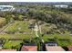Beautiful aerial view showcasing the dog park and its landscaped surroundings with dog-friendly amenities at 10406 Eastwood Dr, Bradenton, FL 34211