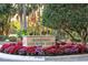The Rosedale Country Club sign is beautifully landscaped with colorful impatiens at 10406 Eastwood Dr, Bradenton, FL 34211