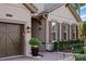 A well-maintained home with a brick driveway, brown shutters, and neat landscaping at 10406 Eastwood Dr, Bradenton, FL 34211